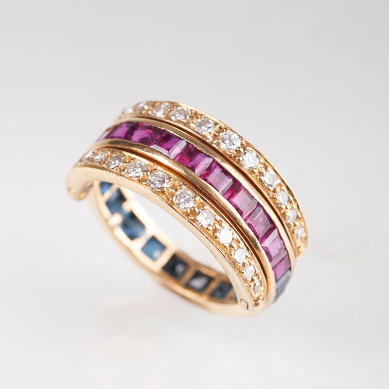 An English ruby sapphire diamond ring