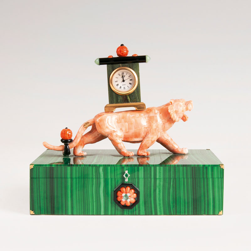 An extraordinary malachite box with clock on pacing coral tiger