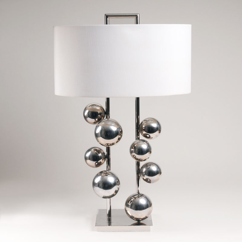 A modern table lamp with nickel-plated balls