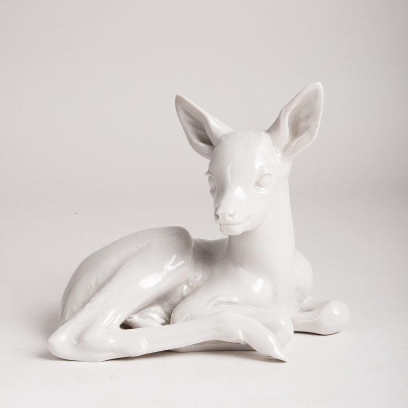 A porcelain figure 'Reclining fawn'
