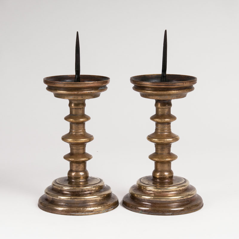 A pair of small Renaissance candlesticks