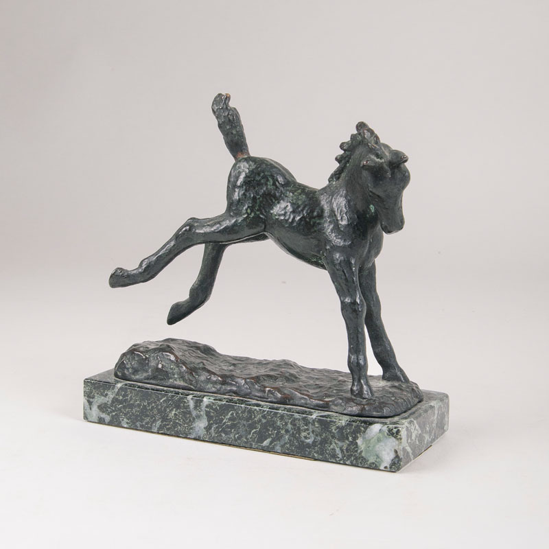 Antonin Mara - A small animal bronze 'Jumping foal' A small animal bronze 'Jumping foal'
