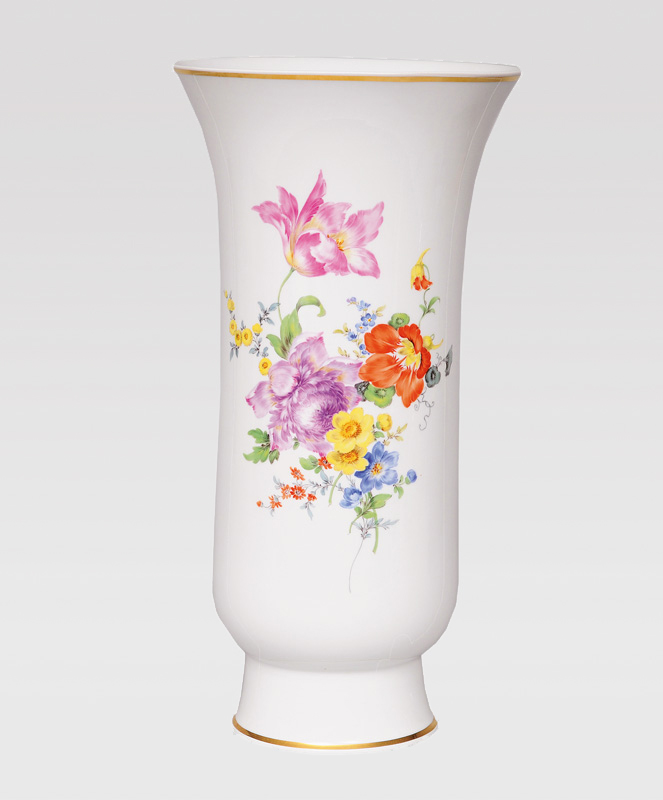 A trumpet vase with flower painting and gold rim