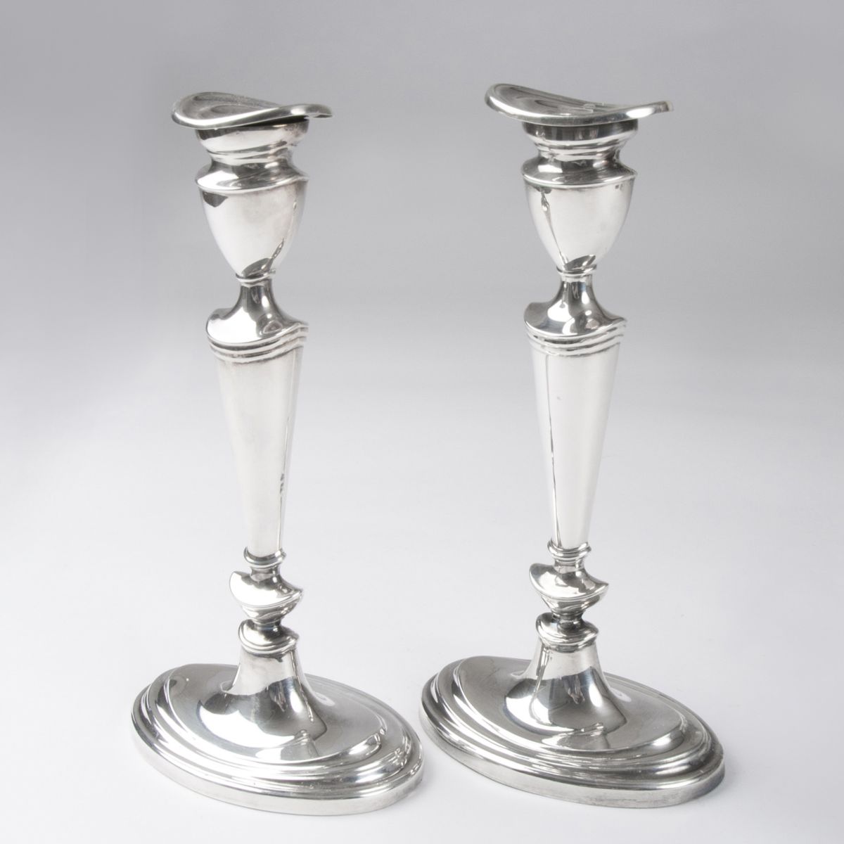 A pair of modern candlesticks