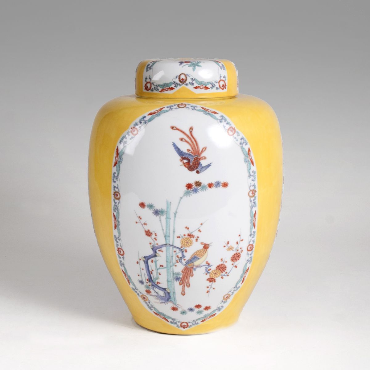 A large lidded vase with 'Shiba Onko' decor and yellow ground