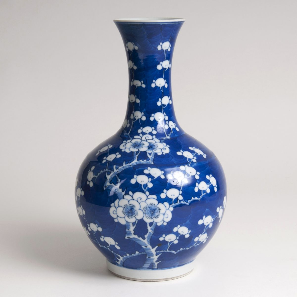 A porcelain baluster-shaped vase with prunus blossoms
