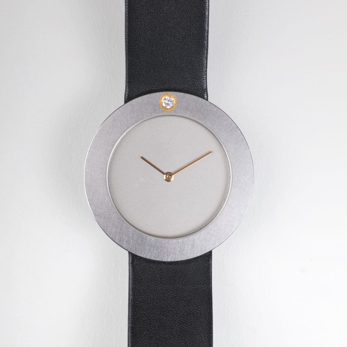 An unisex watch with solitaire diamond