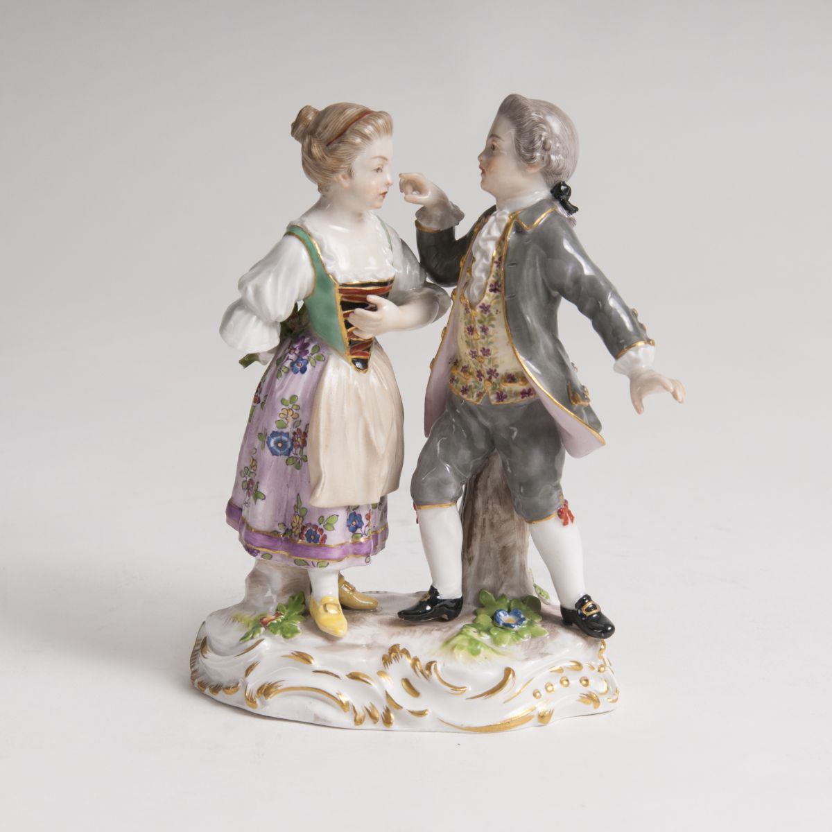 A Porcelain Group 'Young Gentleman and Girl'