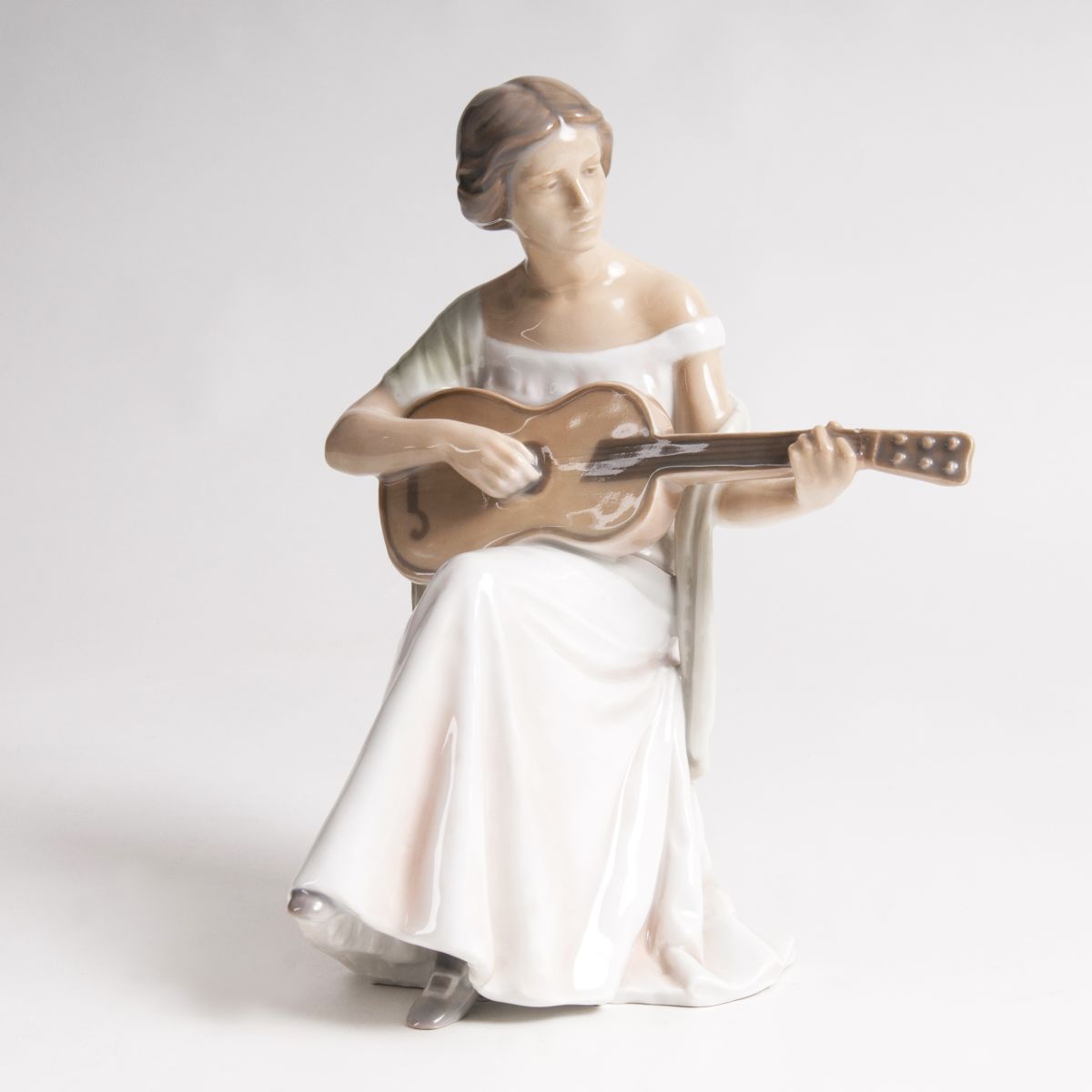 A Porcelain Figure 'Guitar Player'