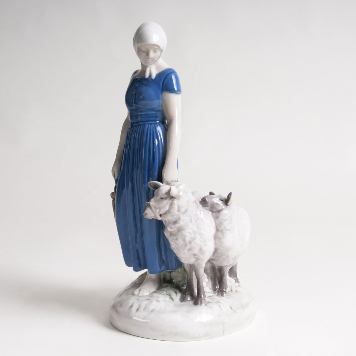 A Porcelain Figure 'Sheperdess'