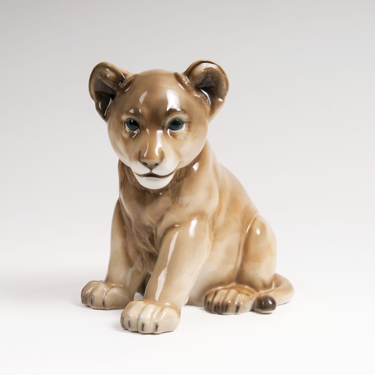 A Porcelain Animal Sculpture 'Young Lion'