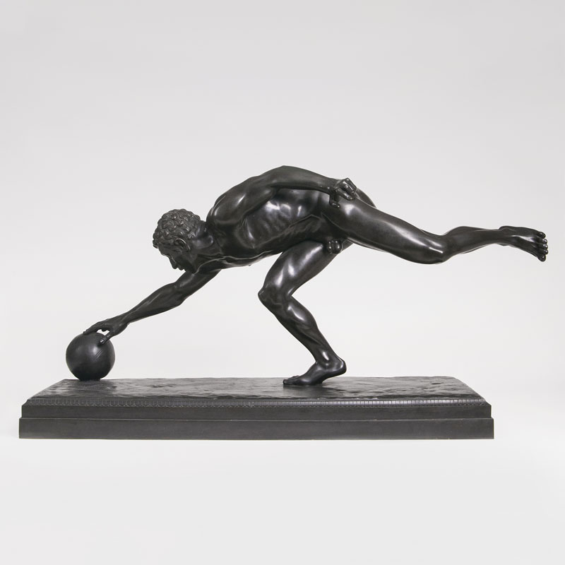A bronze sculpture 'Male nude with ball'