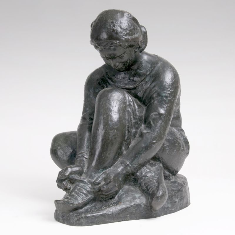 A Bronze Sculpture 'Young peasant woman, tying her sandals'