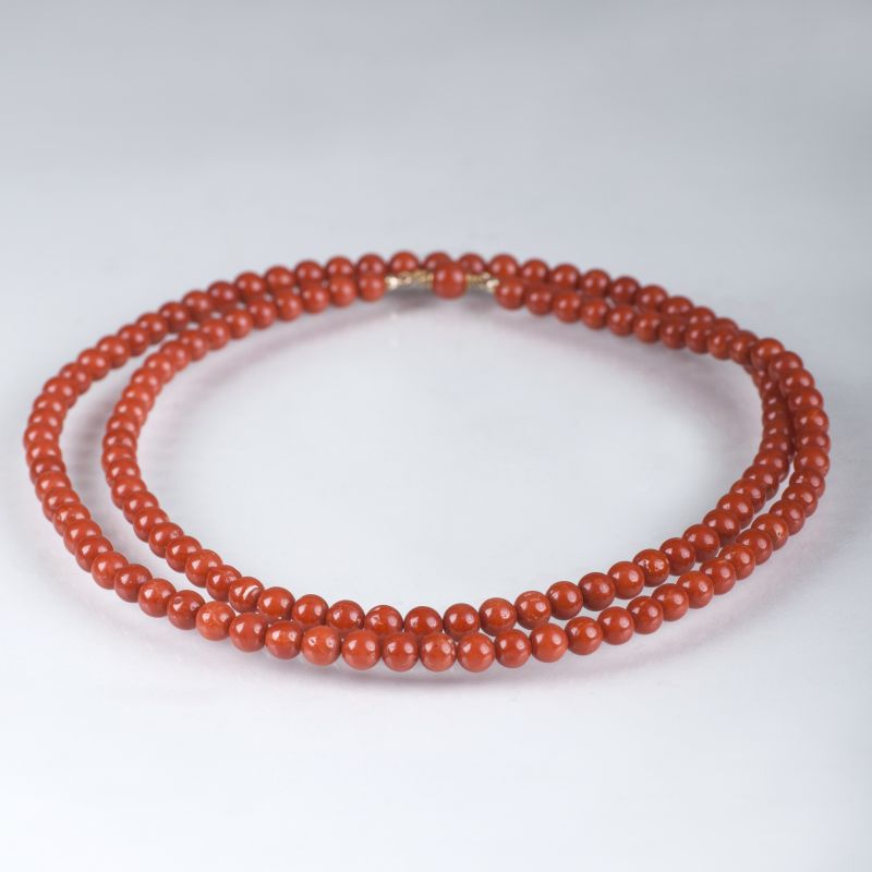 A long coral necklace