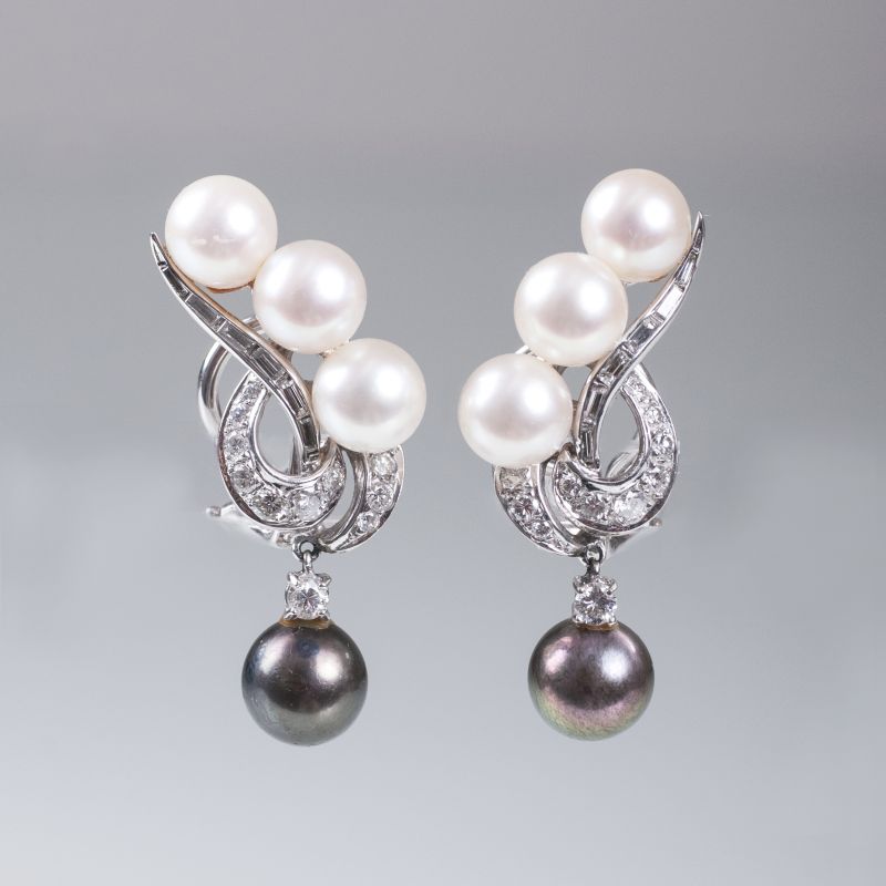 A pair of pearl diamond earclips