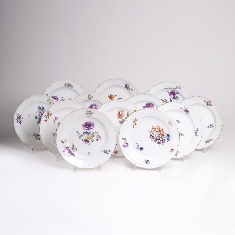 A Set of 12 Plates 'Flowers with Ozier Relief'