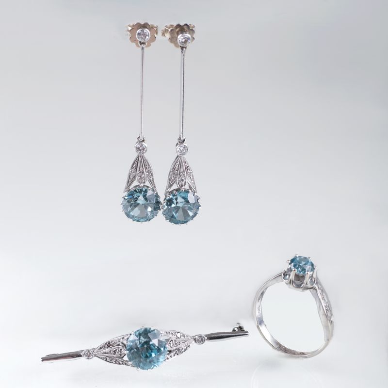 An art nouveau jewellery set with blue zircon and diamond