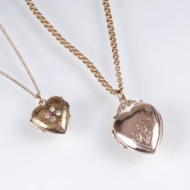 Two antique heart pendants with necklaces