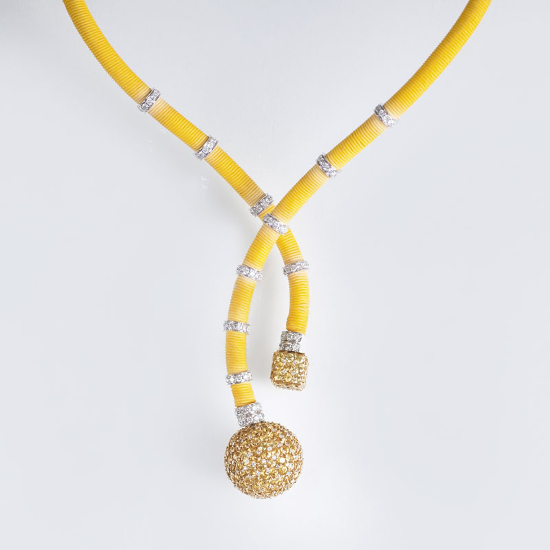 A modern necklace with yellow sapphires and diamonds
