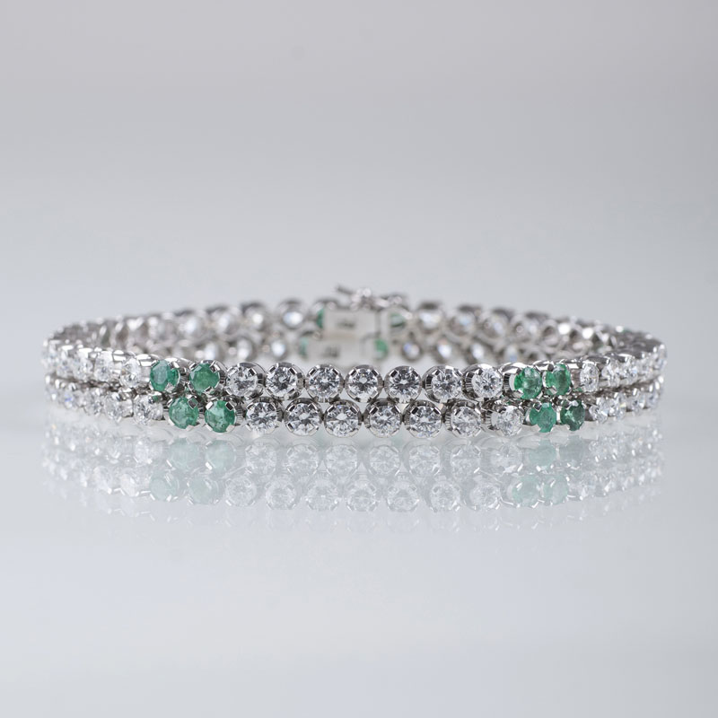 A fine white diamond emerald bracelet