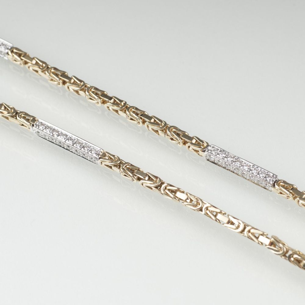 A Gold Necklace with Diamonds