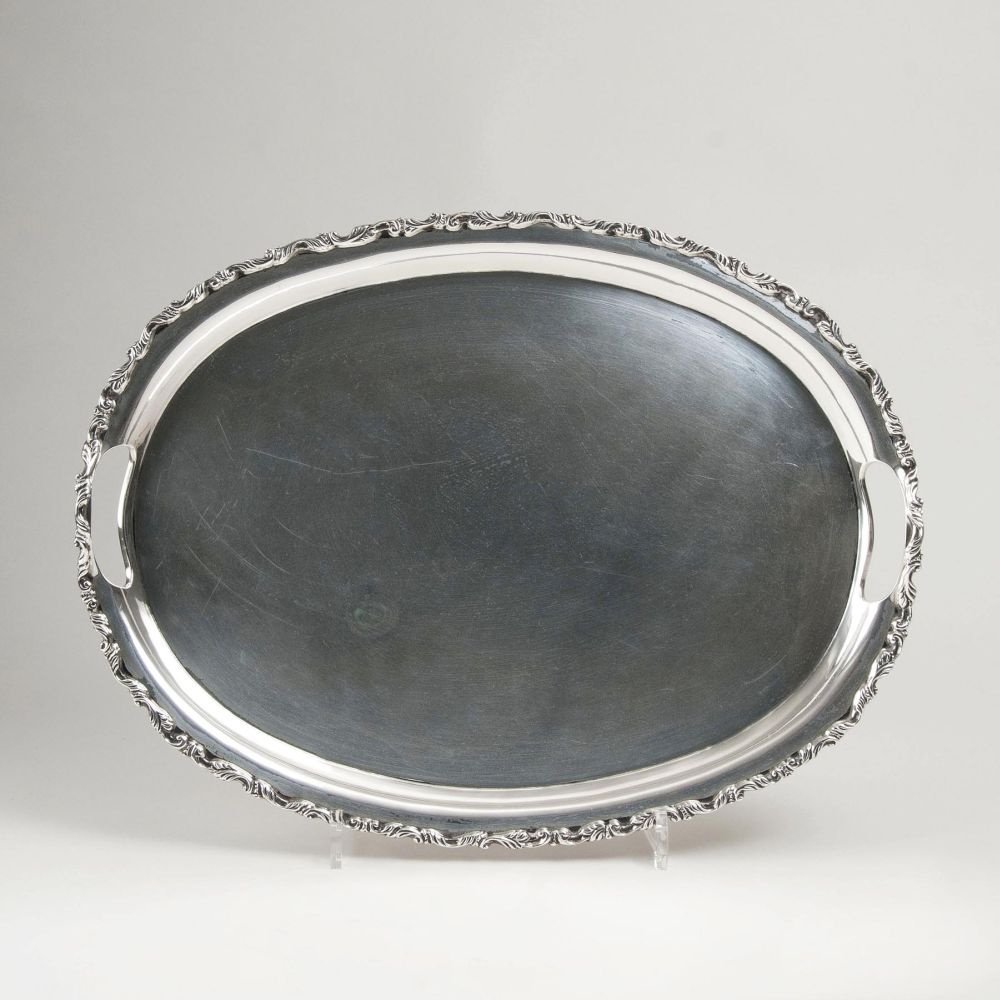 An Oval Handled Tray with Floral Decor