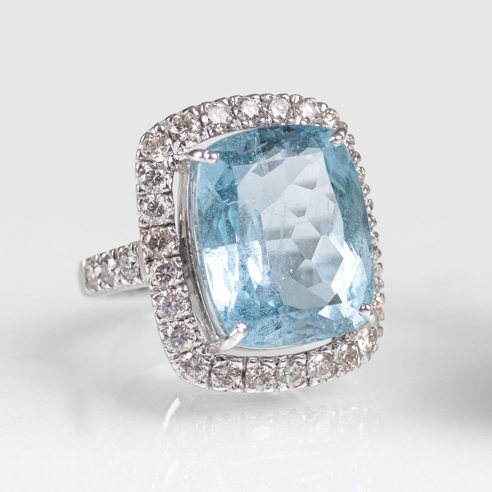 An Aquamarine diamond ring