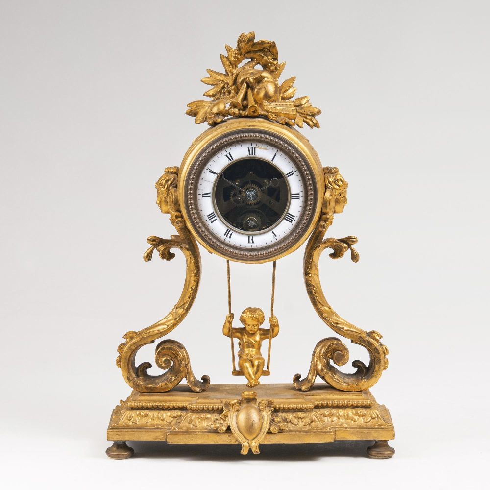 A Napoleon III Pendule with a swinging putto