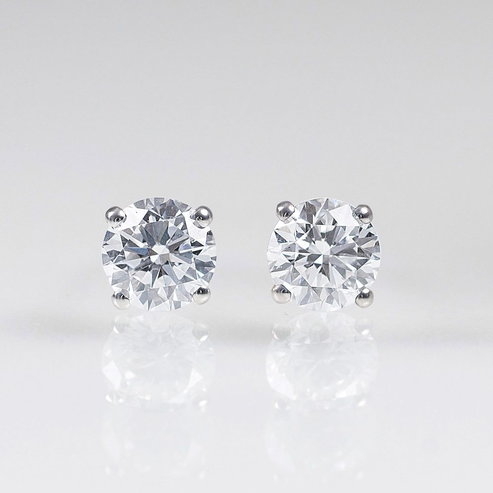 A Pair of splendid, exceptional white Solitaire Earstuds