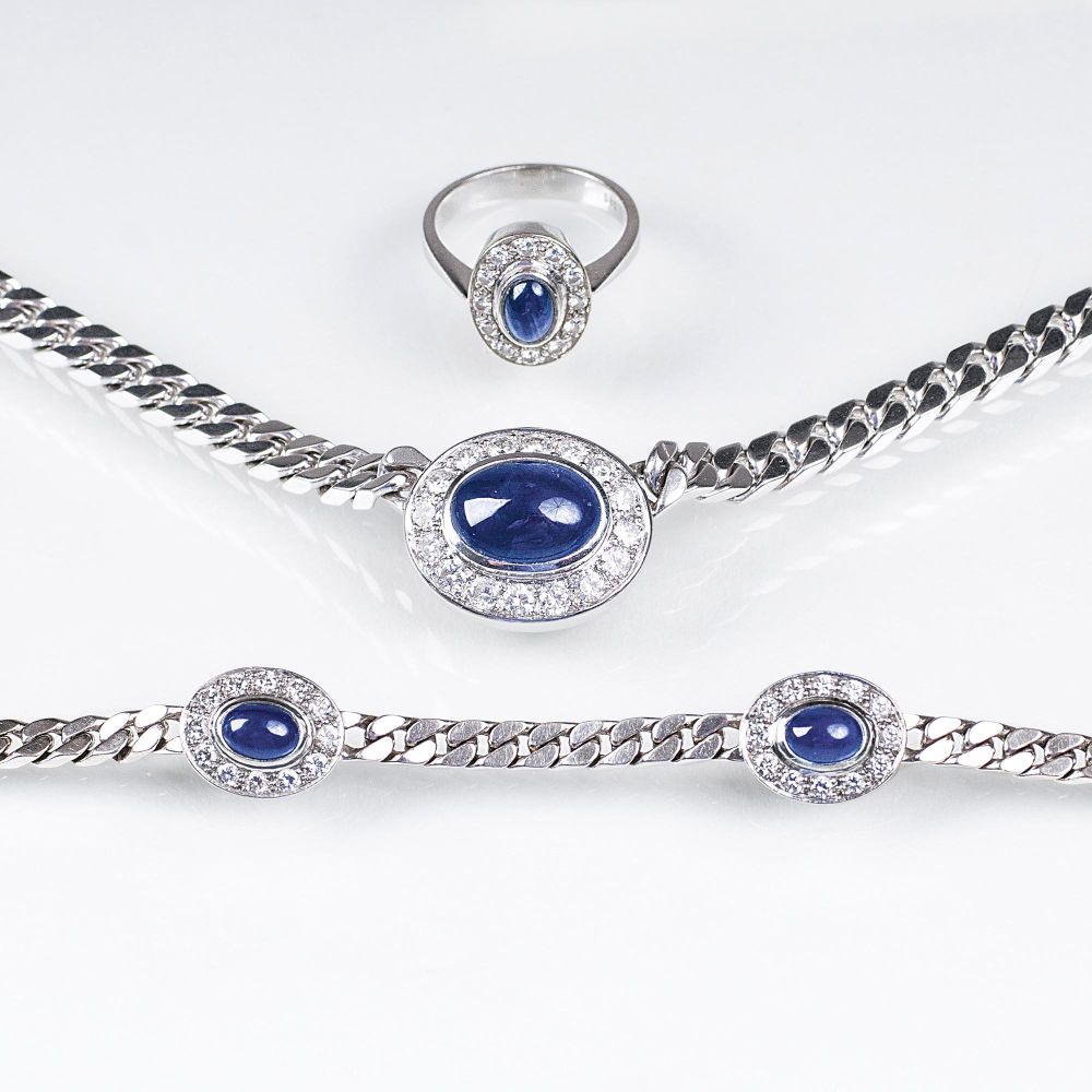 A Sapphire Diamond Jewelry Set: Necklace, Bracelet and Ring