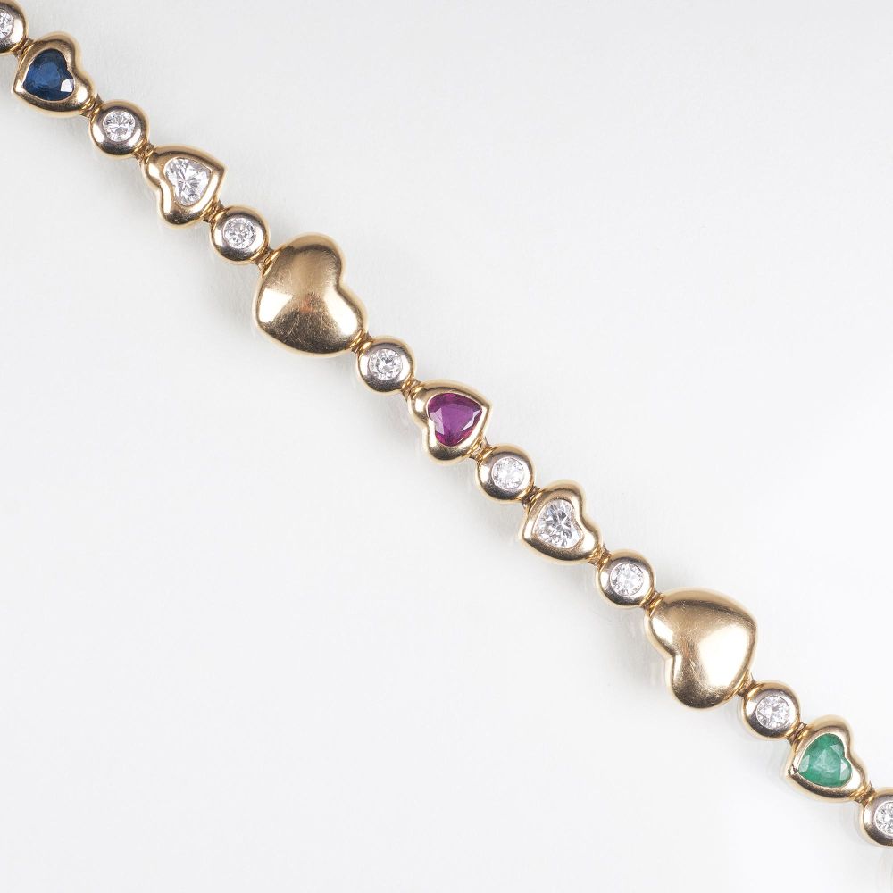 A Vintage Gold Bracelet with Diamonds, Rubies, Sapphires and Emeralds