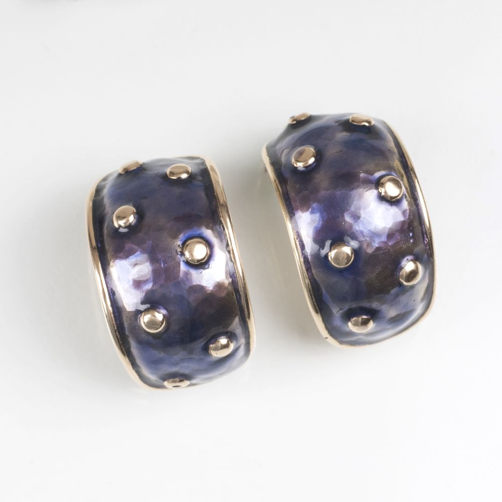 A Pair of Gold Earclips with Enamel Ornaments