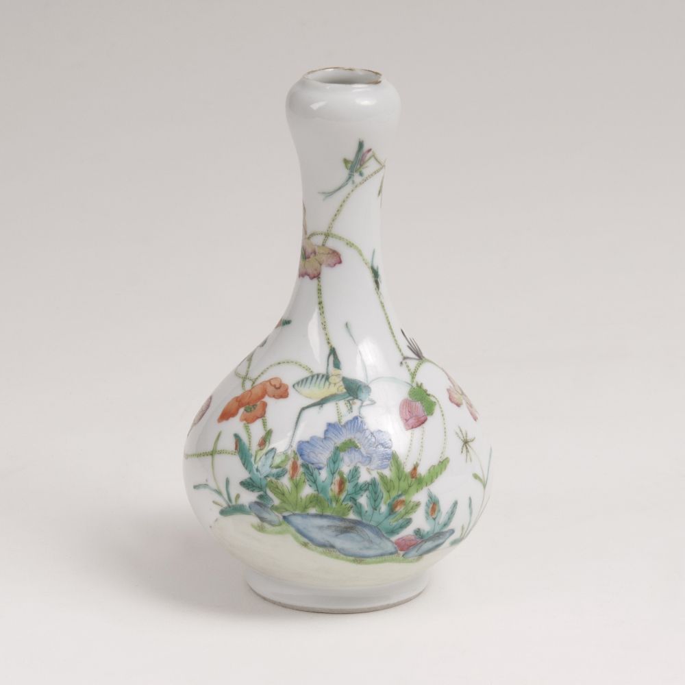 A Small Garlic Vase with Flower Decoration and Insects