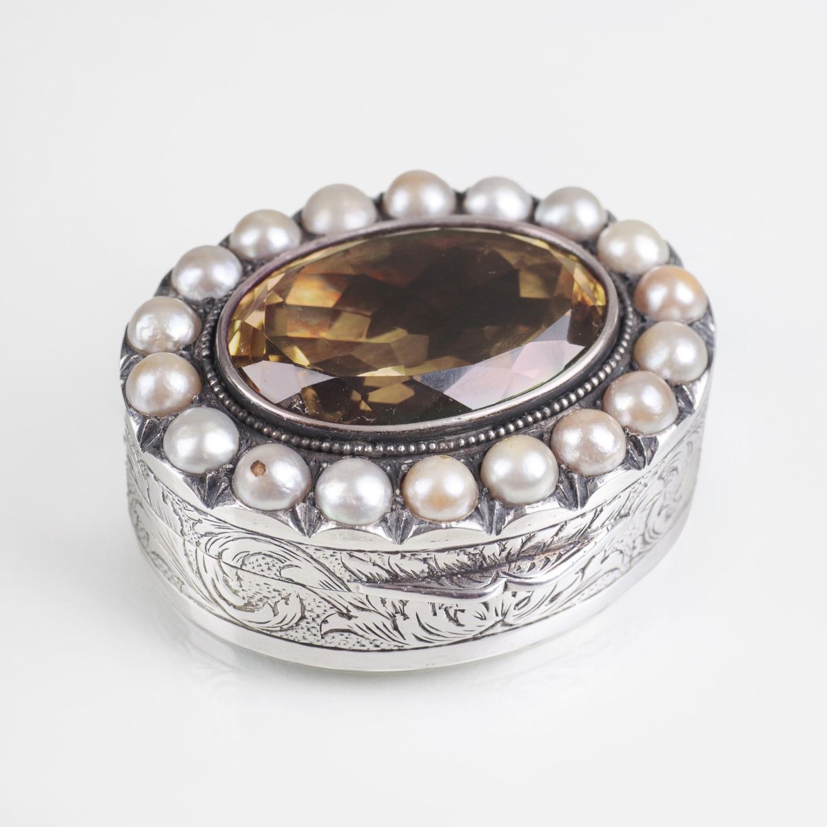 A small box with large citrine and pearls