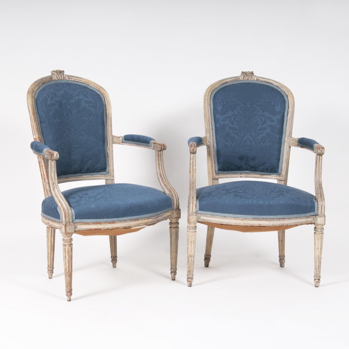 A Pair of Louis Seize Armrestchairs