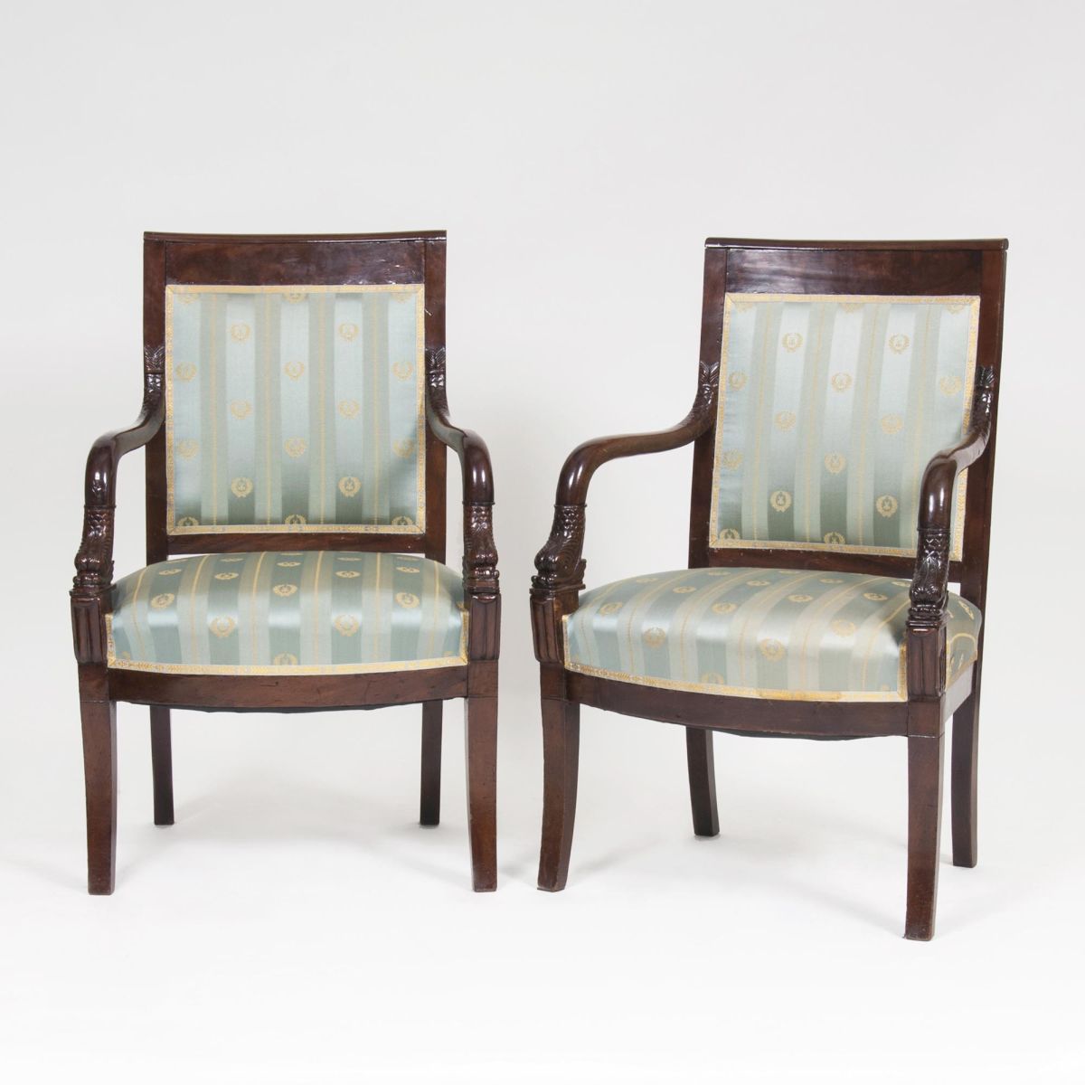 A Pair of Biedermeier Armrestchairs with Dolphin Decor