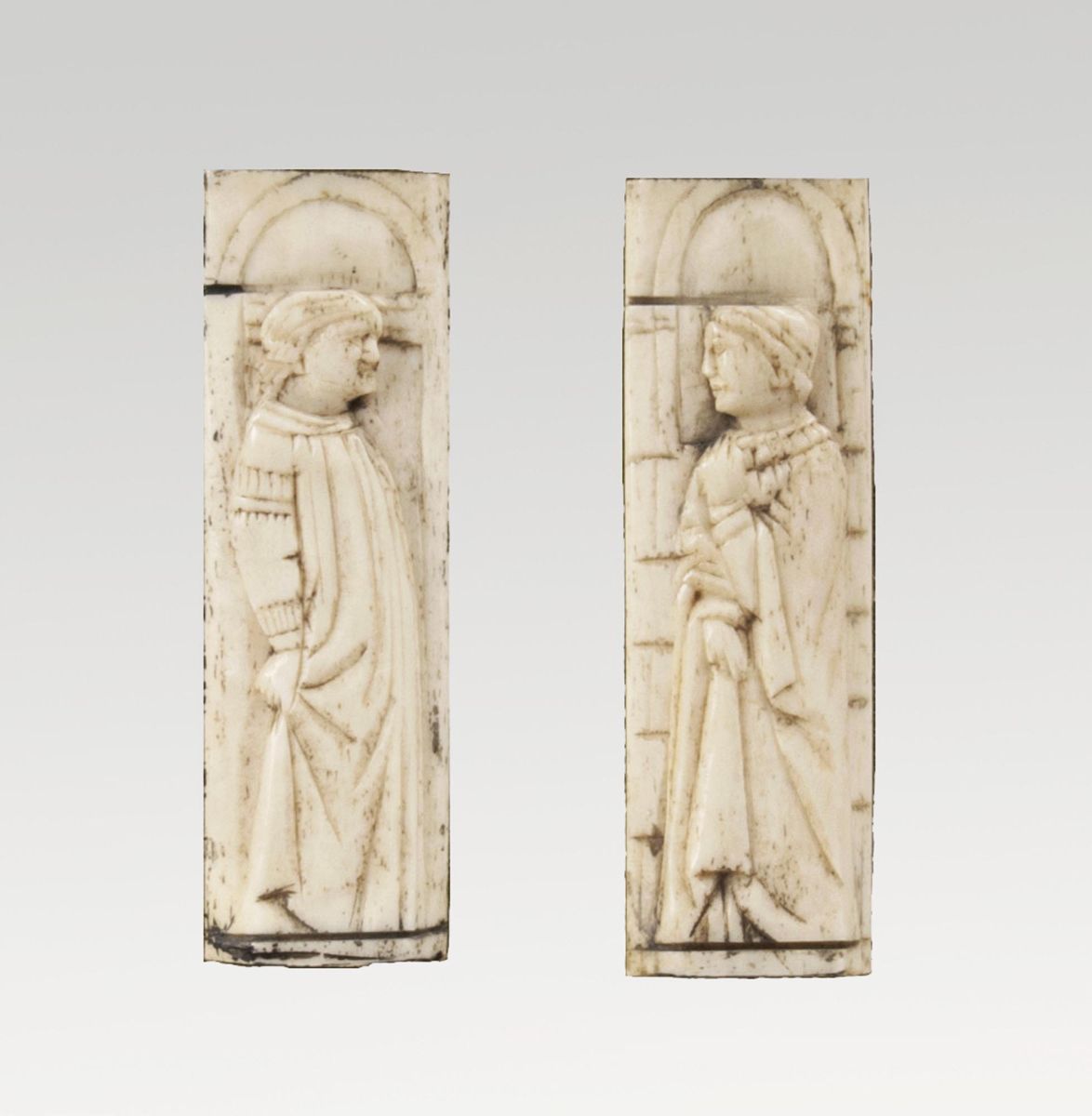 A Pair of Ivory Plaques 'Saints'