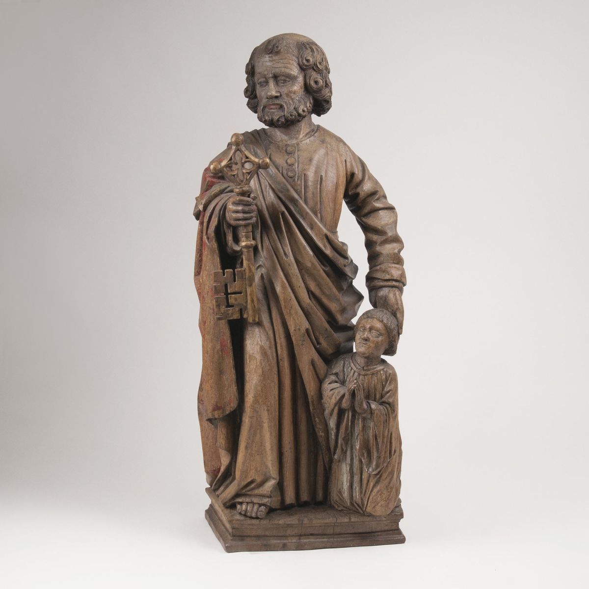 A Figure of Saint Peter with Founder Figure