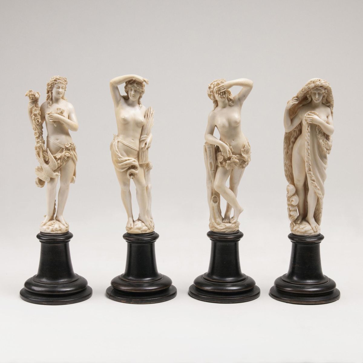 A Set of Four Ivory Figurines 'Four Seasons'