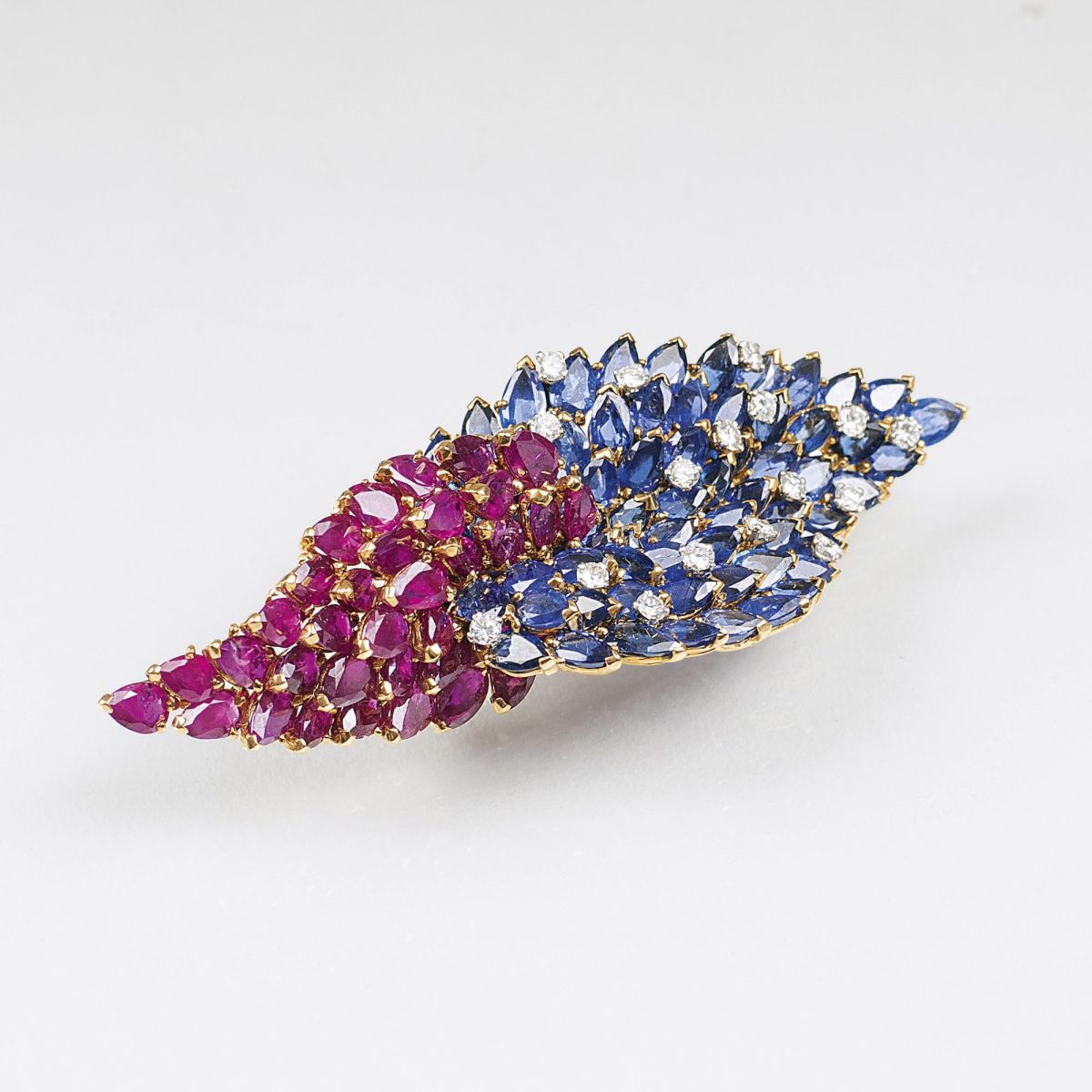 An extraordinary French Vintage Brooch with Rubies, Diamonds and Natural Sapphires