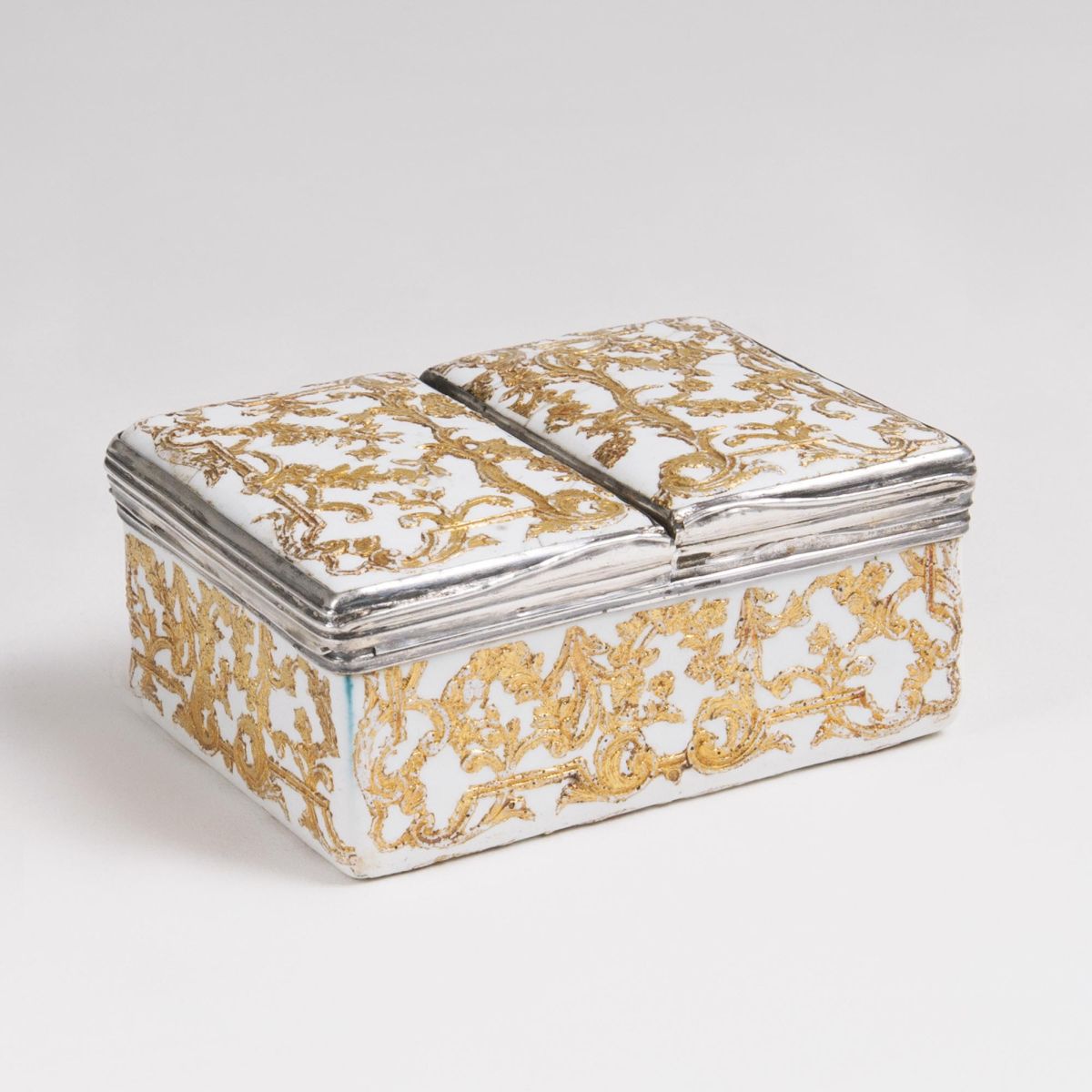 A Berlin Enamel Snuff Box with Gold Relief Decor A Berlin Enamel Snuff Box with Gold Relief Decor