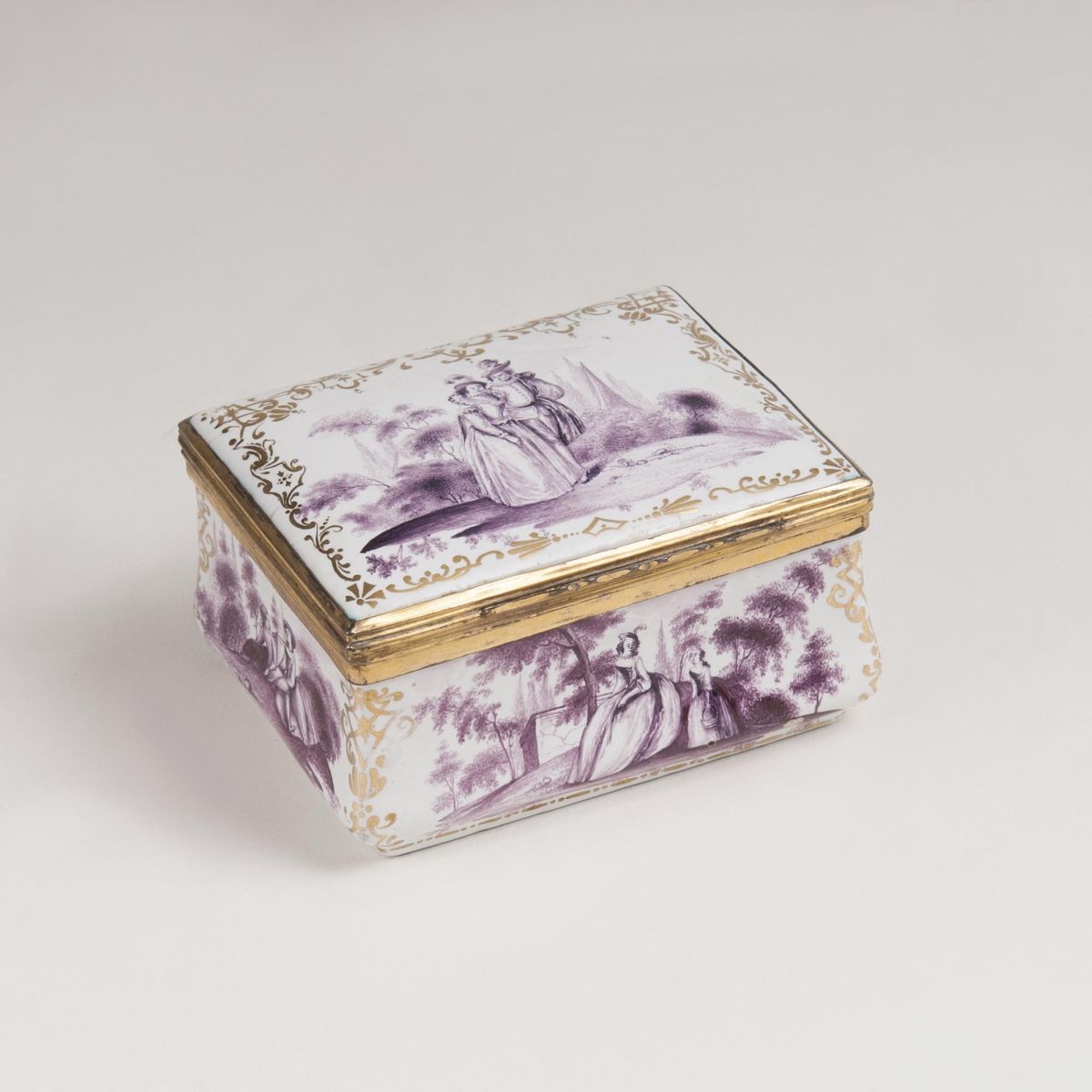 An Enamel Snuff Box with Watteau Scenes in Purple Monochrome