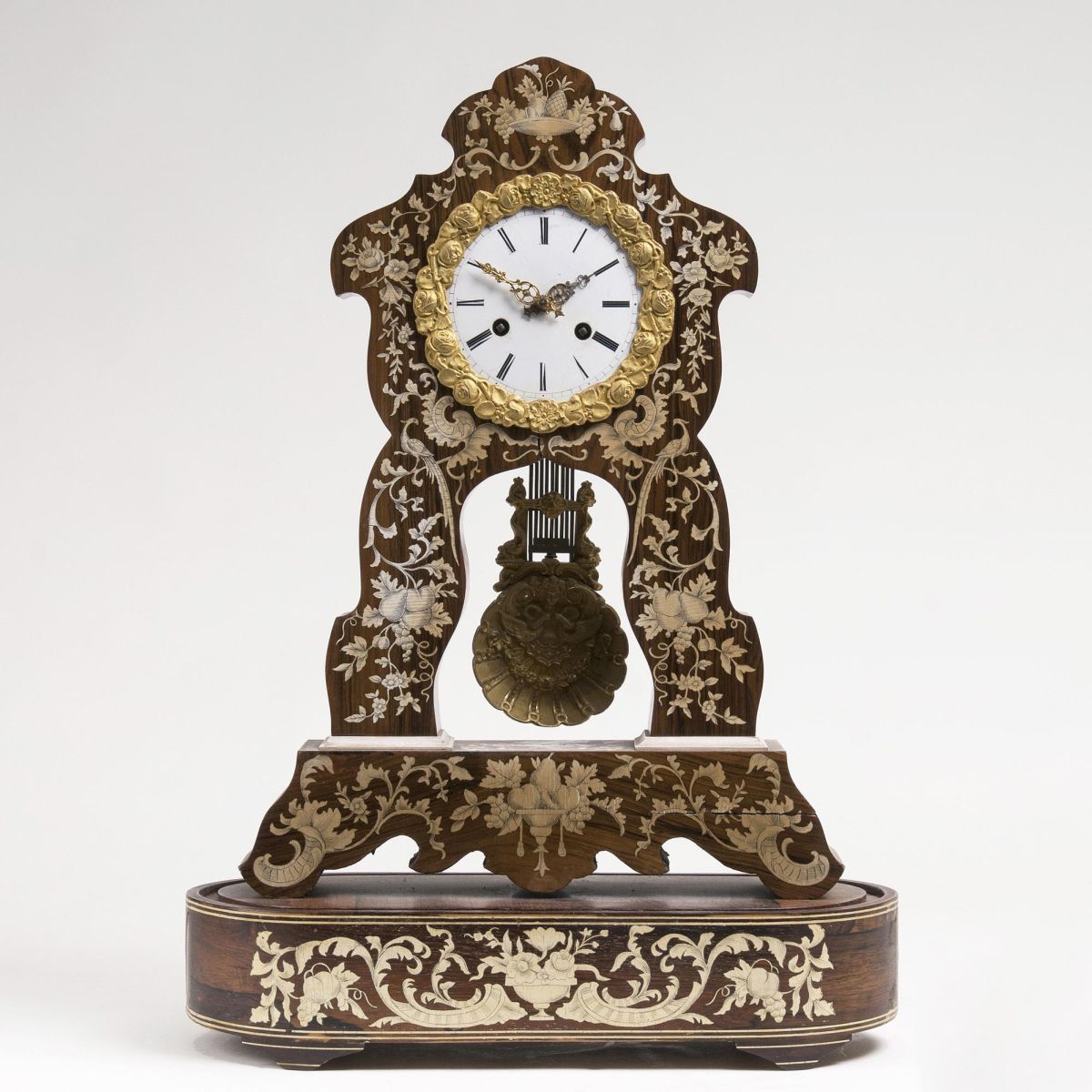 A Napoleon III Pendule with floral marquetry