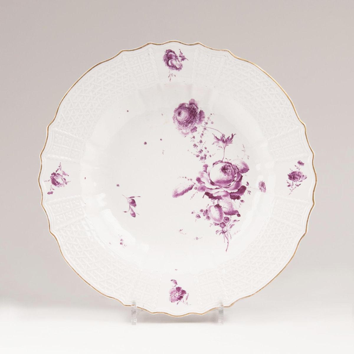 A Large Round Plate with Crimson Flowers