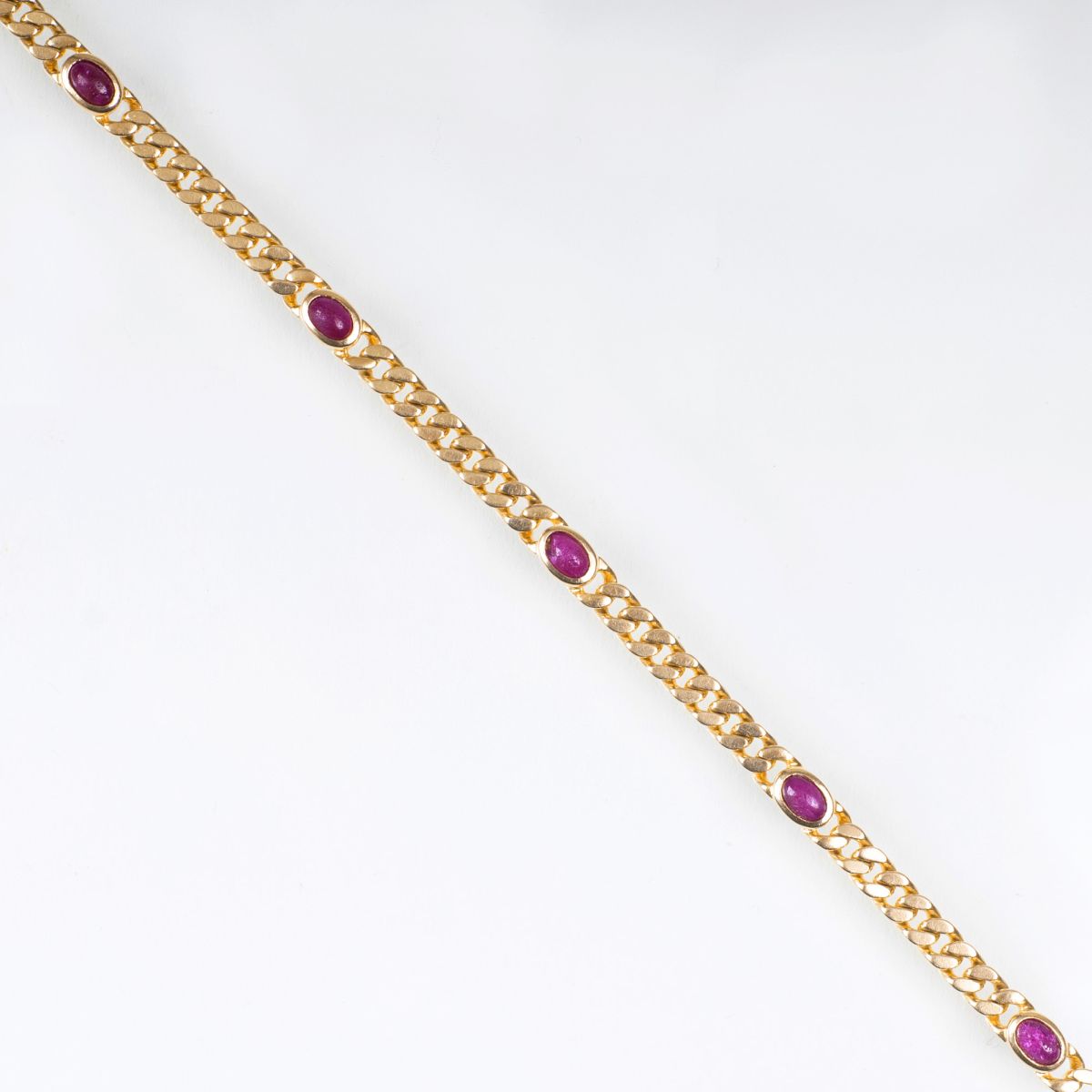 A Gold Bracelet with Rubies