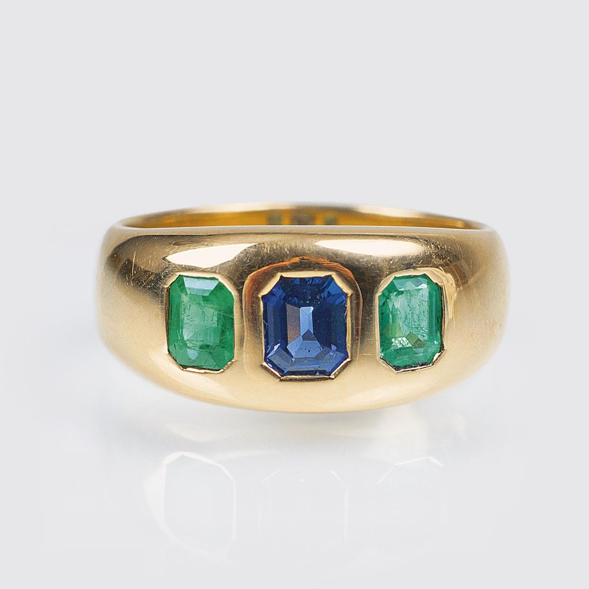 A Gold Ring with Emeralds and Sapphire