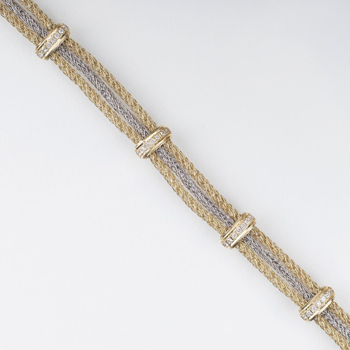 A two-coloured Gold Bracelet with Diamonds