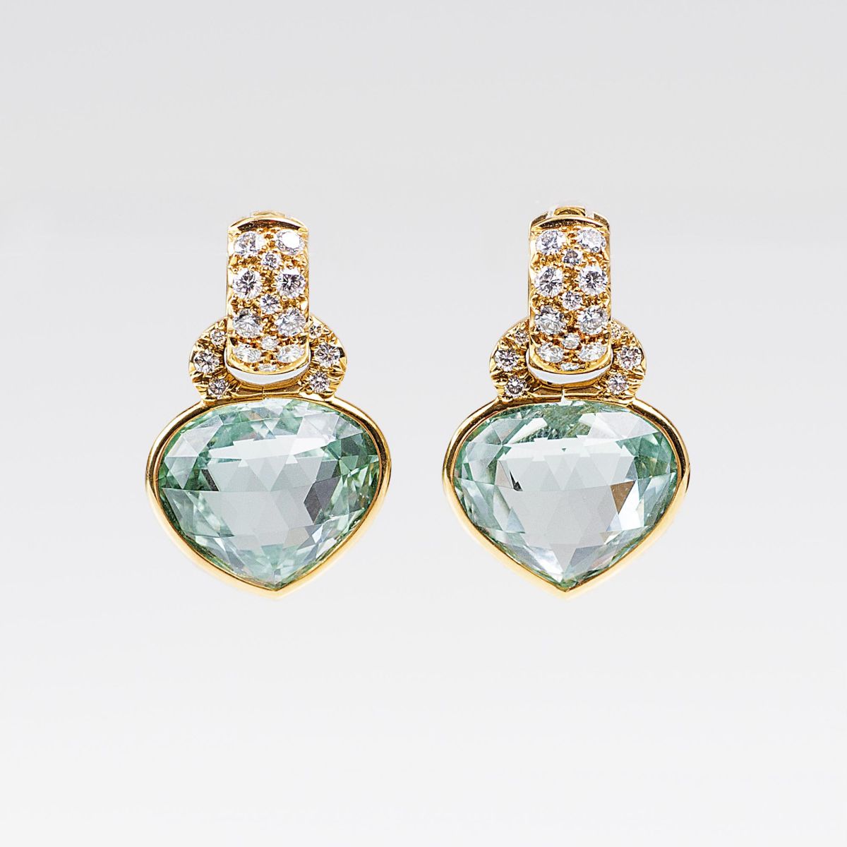 A Pair of Earrings with Aquamarines in Heart shape