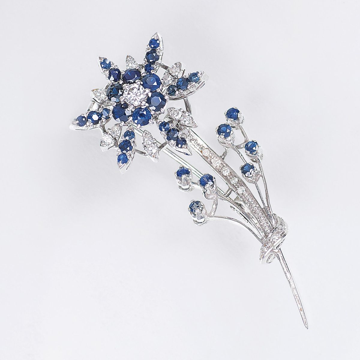 A Flower Brooch with Sapphires and Diamonds