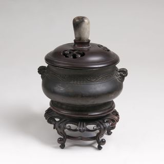 A Delicate Incense Burner with Lion's Head Handles